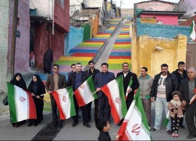 آیین نصب پرچم توسط اهالی رسانه گلستان در کوی محتشم برگزار گردید
